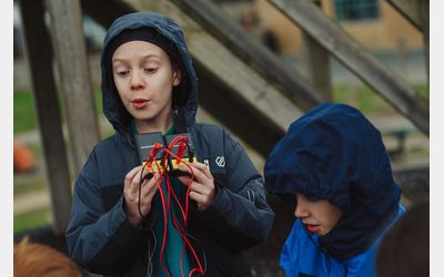 School children working with solar electricity kits during a group project.